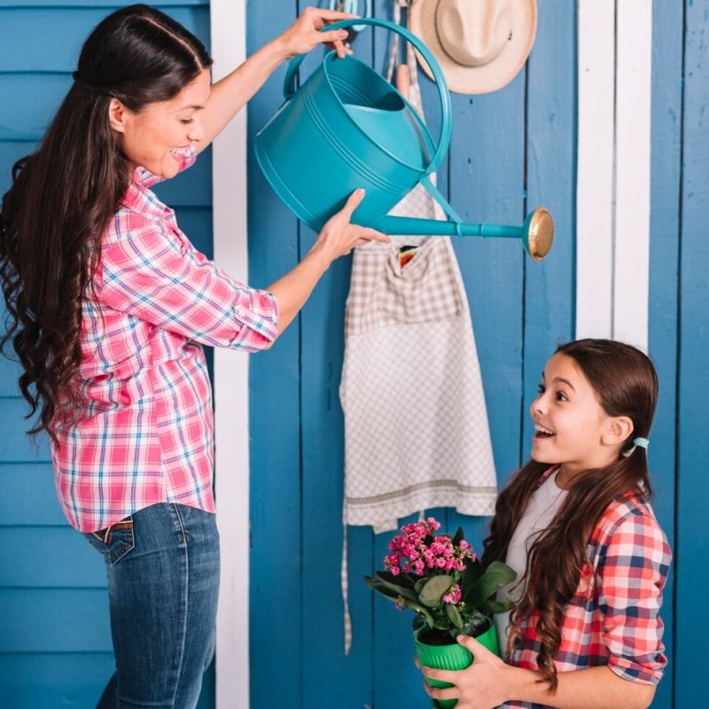 gardening-concept-with-mother-daughter_23-2148000020